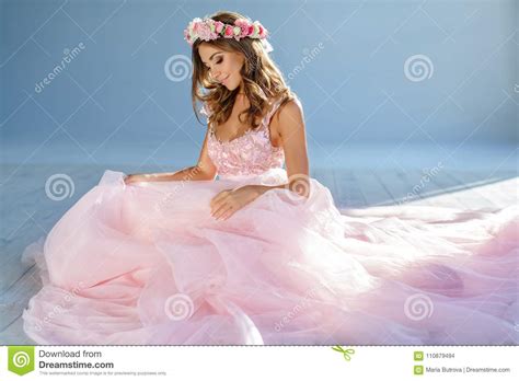 Delicate Beautiful Girl In A Pink Dress And Wreath Of Flowers Sm Stock