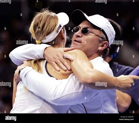 Russias Maria Sharapova Hugs Her Father Yuri Sharapova After Defeating