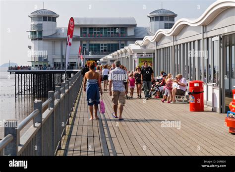 People Walking Along The Grand Pier Weston Super Mare Stock Photo Alamy