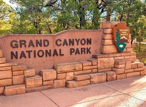 The Entrance Sign To Grand Canyon National Park Arizona Usa 7
