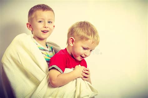 Two Little Boys Siblings Playing With Towels Stock Image Image Of