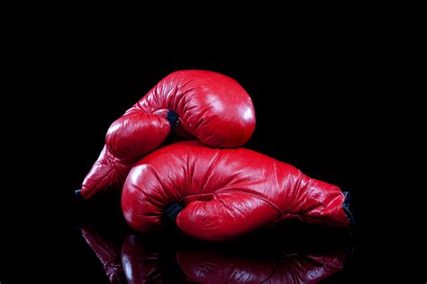 Pair Of Red Boxing Gloves On Black