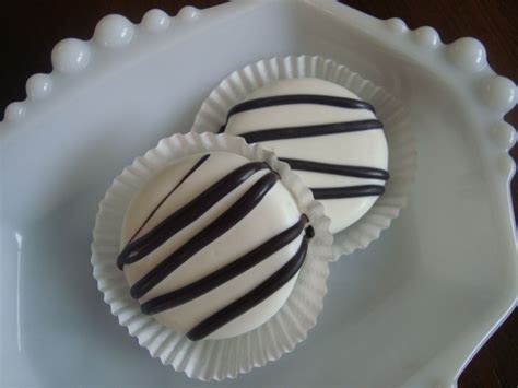 White Chocolate Dipped Oreo Cookies With Zebra Stripes