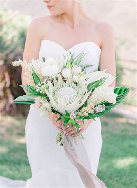 Whether you are having an outdoor or indoor ceremony and reception flowers will be a large part of your decor. Modern Boho Tropical Wedding in Malibu | Tropical wedding ...