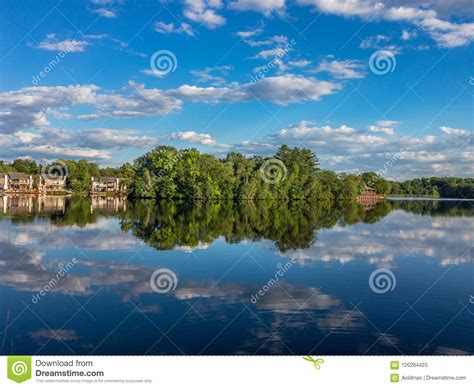Reflection Of The Cloudy Sky In The Water Of Little Lake Stock Image