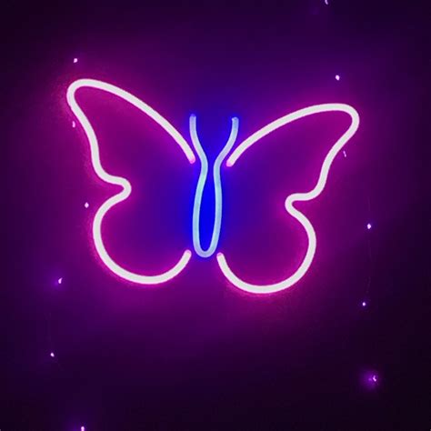 A Neon Sign With A Butterfly On It