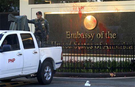 manila us embassy protest 3 people run over by police truck others tear gassed