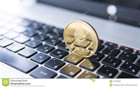 Gold Ethereum Coin On A Laptop. Ethereum Crypto Currency ...