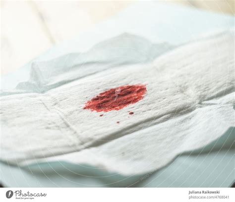 Sanitary Napkin With Blood Stain A Royalty Free Stock Photo From