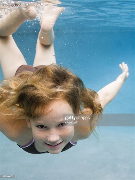 Portrait Of A Girl Swimming Underwater High Res Stock Photo Getty Images