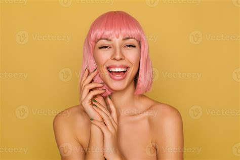 Studio Photo Of Cheerful Young Pretty Pink Haired Woman Laughing