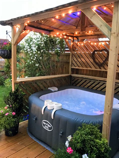 Summer is time for outdoors! lay z spa wooden enclosure - Google Search | Hot tub patio ...