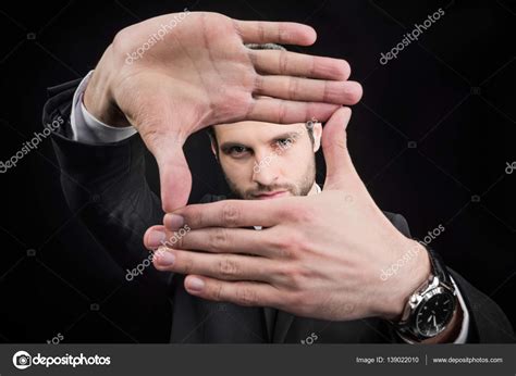 Man making focus framing gesture — Stock Photo © IgorTishenko #139022010