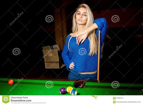 Cutie Young Blonde With Blue Eyes Plays Pool Billiard Stock Image