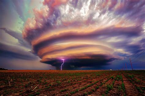 A Powerful Storm Cloud Over A Field Phone Wallpapers