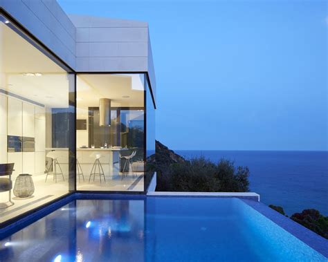 Modern Hillside Coastal Home In Spain With Magnificent Ocean View