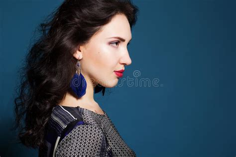 Brunette Lady With Feather Earring Stock Image Image Of Elegant