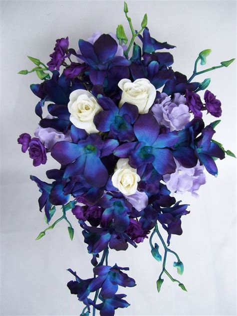 Noelle S Cascade Bridal Bouquet Purple Spray Roses White Closed Roses Blue Violet Ca Orchids