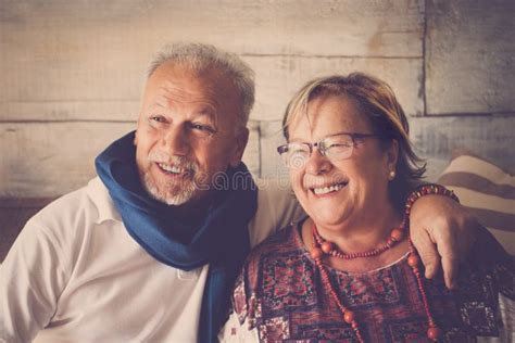 Happy Old Mature Couple Have Fun At Home In Smiling Portrait Elderly