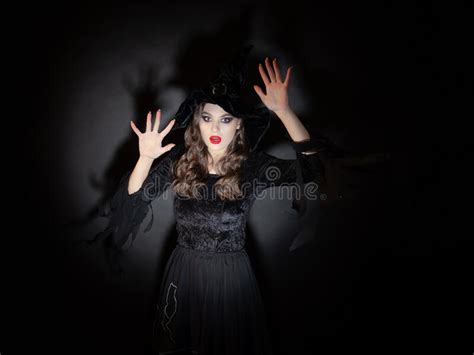 Witch At Halloween Party A Young Beautiful Brunette Woman In A Classic
