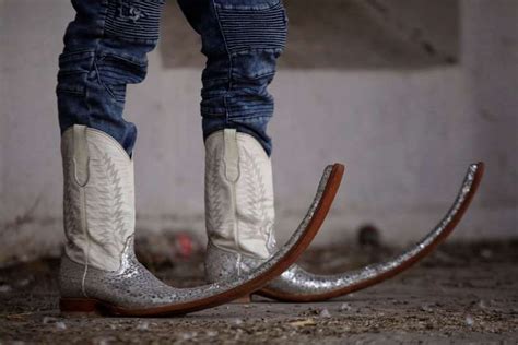 Tv Host Farid Pina Poses For A Picture Wearing His Mexican Pointy Boots In Ciudad Juarez Mexico