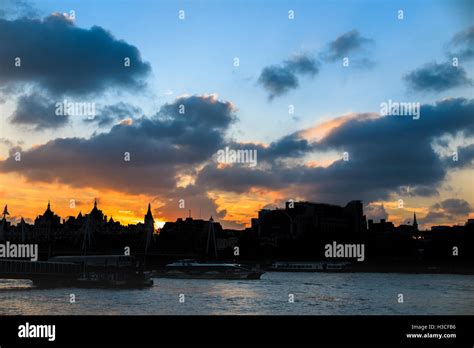 Sunset Silhouetting Buildings Across The River Thames At Whitehall And