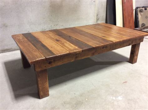 Made from wood salvaged from the midwestern us and chicago from pre 1920's inside barns, buildings and old factories. Large Reclaimed Wood Coffee Table