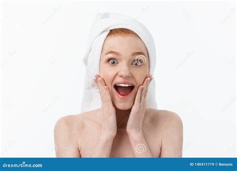 Surprised Beautiful Young Woman After Bath With A Towel On Her Head