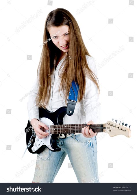 Teen Girl Holding A Guitar Like A Rock Star Stock Photo 88425877
