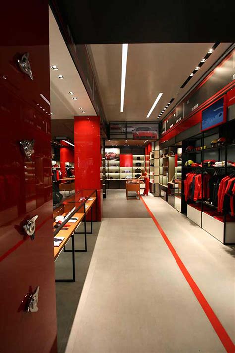 Our watches make the perfect gift. Ferrari store by Iosa Ghini Associates, Madrid » Retail Design Blog