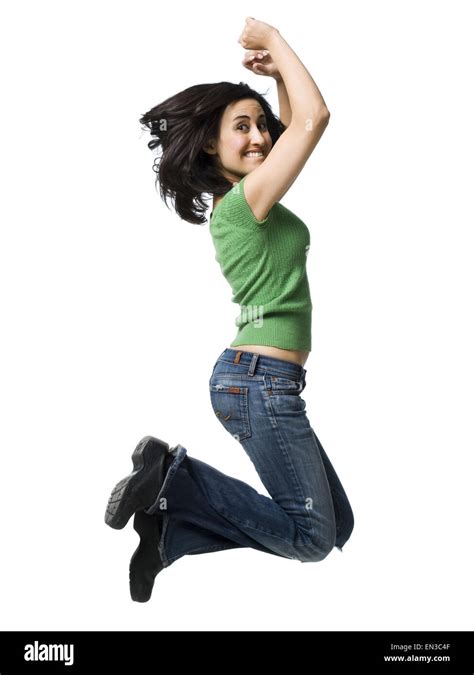 Woman Leaping And Smiling Stock Photo Alamy