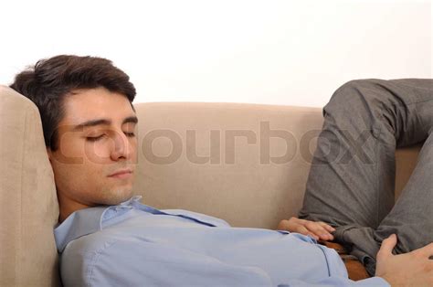 Man Sleeping On The Couch Stock Image Colourbox