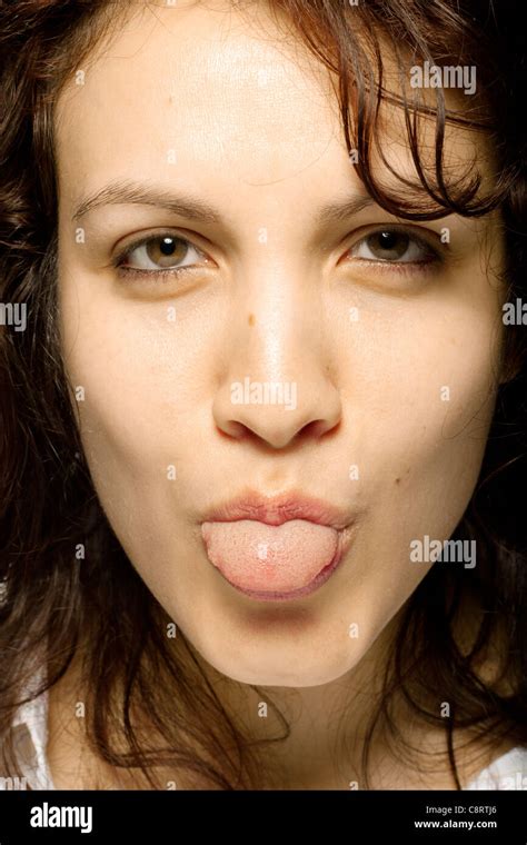 Woman Sticking Out Her Tongue Stock Photo Alamy