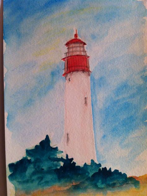 Watercolor Painting Of A Lighthouse On The Coast With Blue Sky And