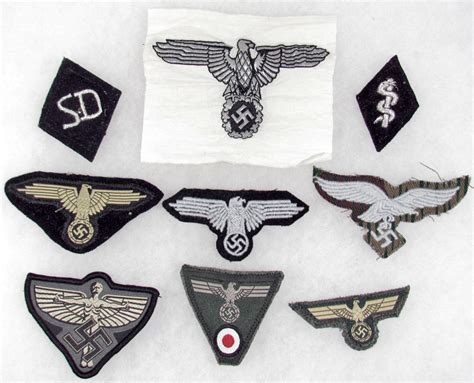 Lot Of 9 German Nazi Ss Army And Luftwaffe Insignias