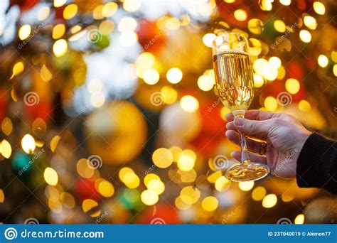 Human Hands With Glasses Of Champagne On A Christmas Or New Year Background Stock Image Image