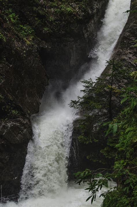 Cascading Waterfall In A Gorge By Stocksy Contributor Neil Warburton