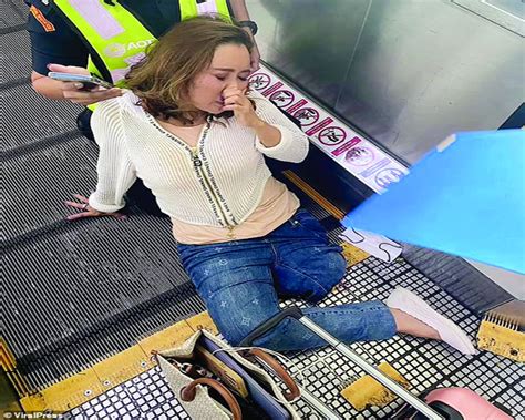 Womans Leg Gets Stuck In Thai Airport Walkway