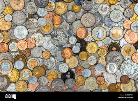 Currency A Collection Of Old Coins From Around The World Stock Photo