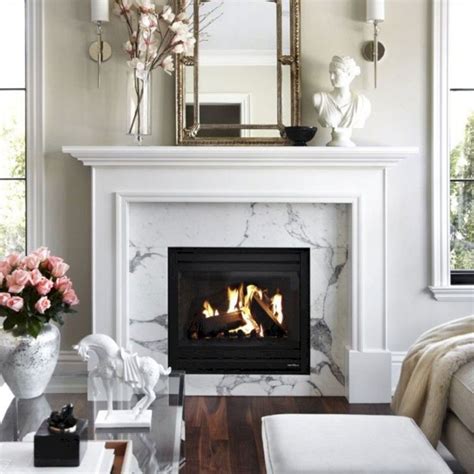 All wood, dry or wet, moves with seasonal changes and the stone does not. White Fireplace Mantel Ideas - DECOREDO