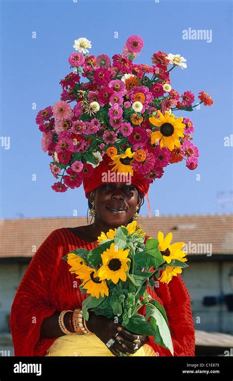 Senegal Dakar Region Kermel Market Woman Carrying Flowers On Sale On