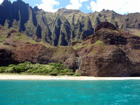 Cliffs And Waterfall At Na Pali Coast Kauai Hawaii Stock Photo