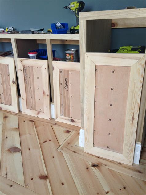 Match the inside of the cabinet to the exterior for a unified. White Wood : DIY shaker doors