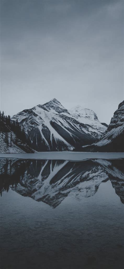 Snow Mountains And Lake Undr Gray Sky Iphone 11 Wallpapers Free Download