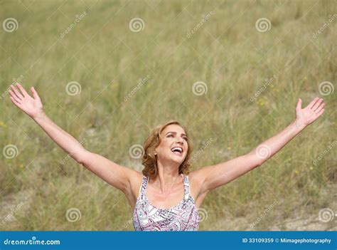 Carefree Woman Standing With Arms Outstretched Stock Image Image Of Enjoying Attractive 33109359