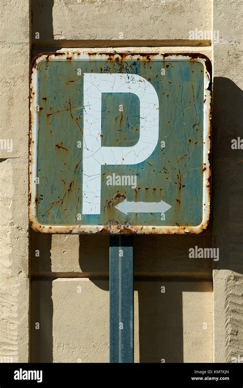 An Old And Rusty Parking Sign Stock Photo Alamy