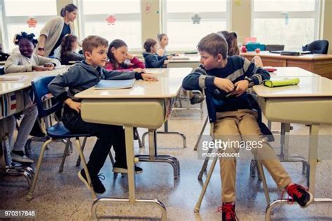 Naughty Kids In Classroom Photos And Premium High Res Pictures Getty