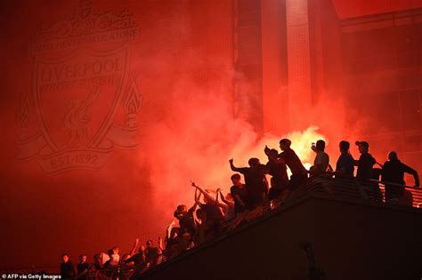 Thousands Of Liverpool Fans Party Into The Night At Anfield Ignoring