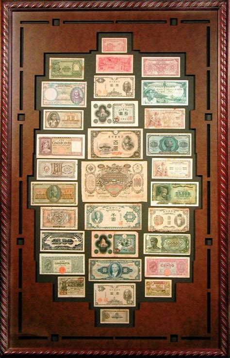Collection Of International Currency In A Bradleys Custom Frame