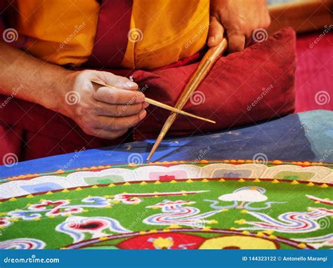 Buddhist Monk Create Drawing Mandala With Multicolor Sands Selective
